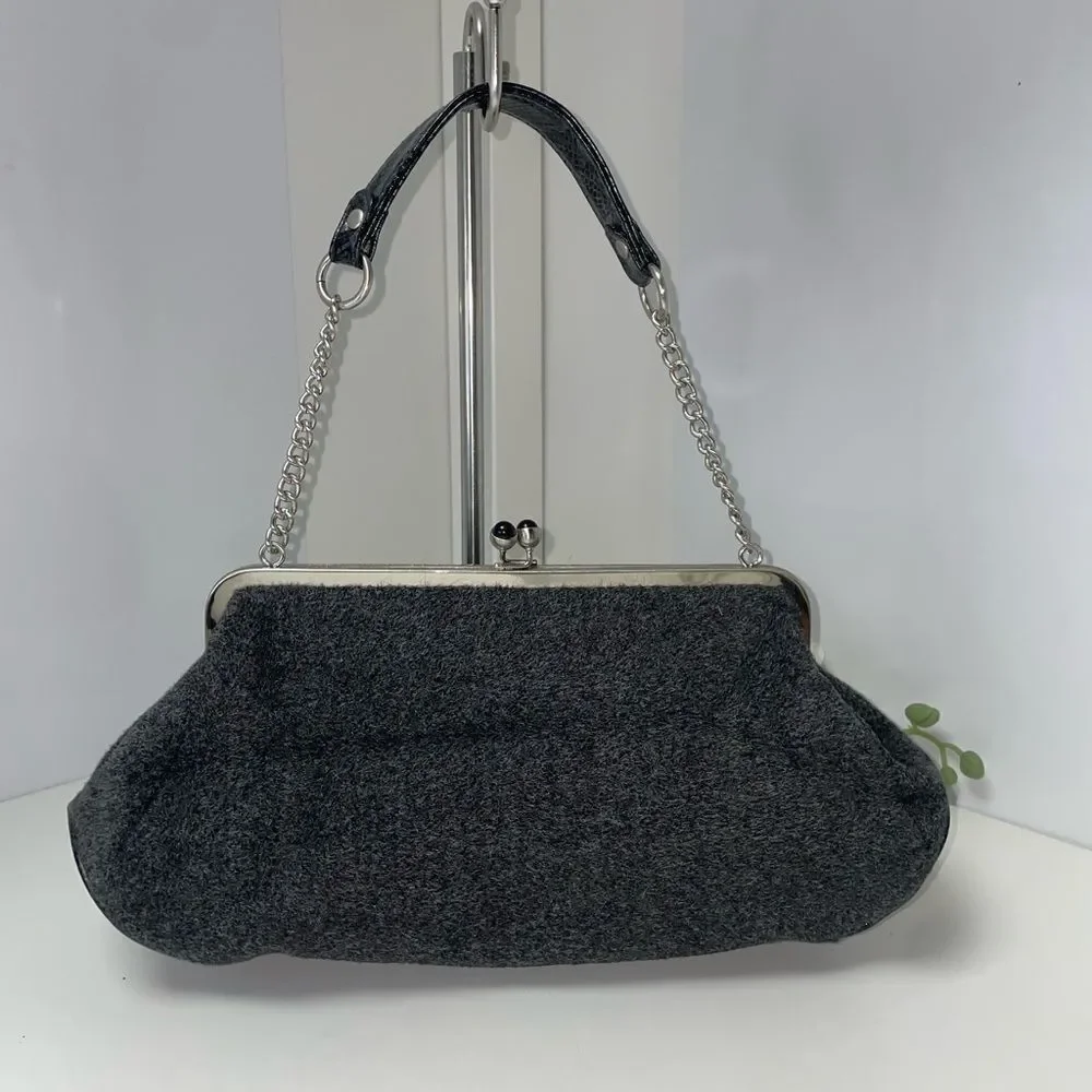 Elegant Black Shoulder Bag with Heart Details